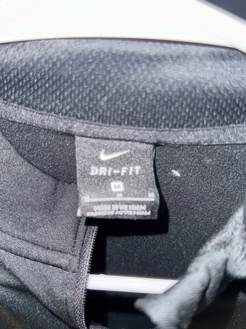 Nike Black Dri-FIT Quarter-Zip Performance Top with White Swoosh